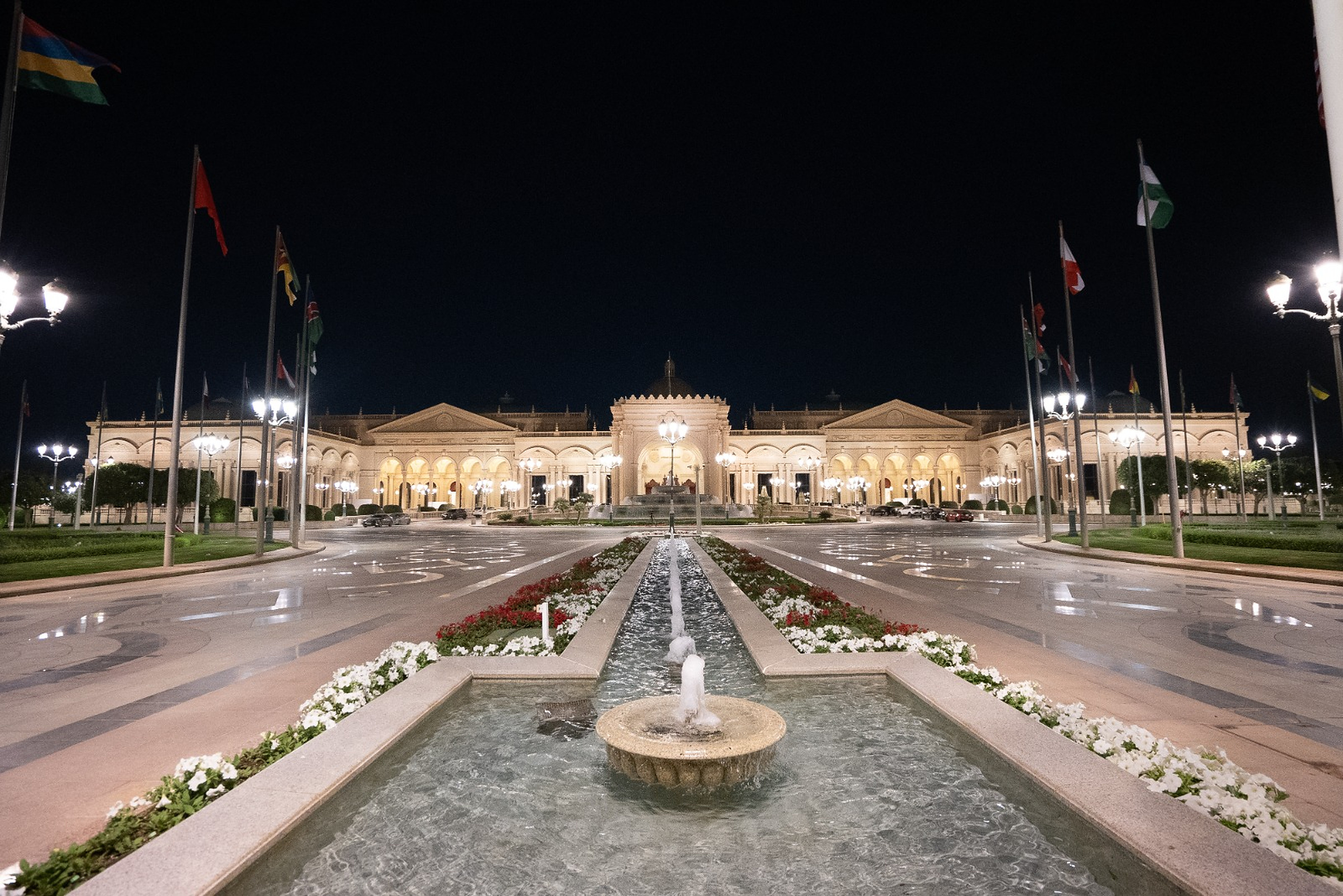 Grand palace exterior at night — campaign visual direction